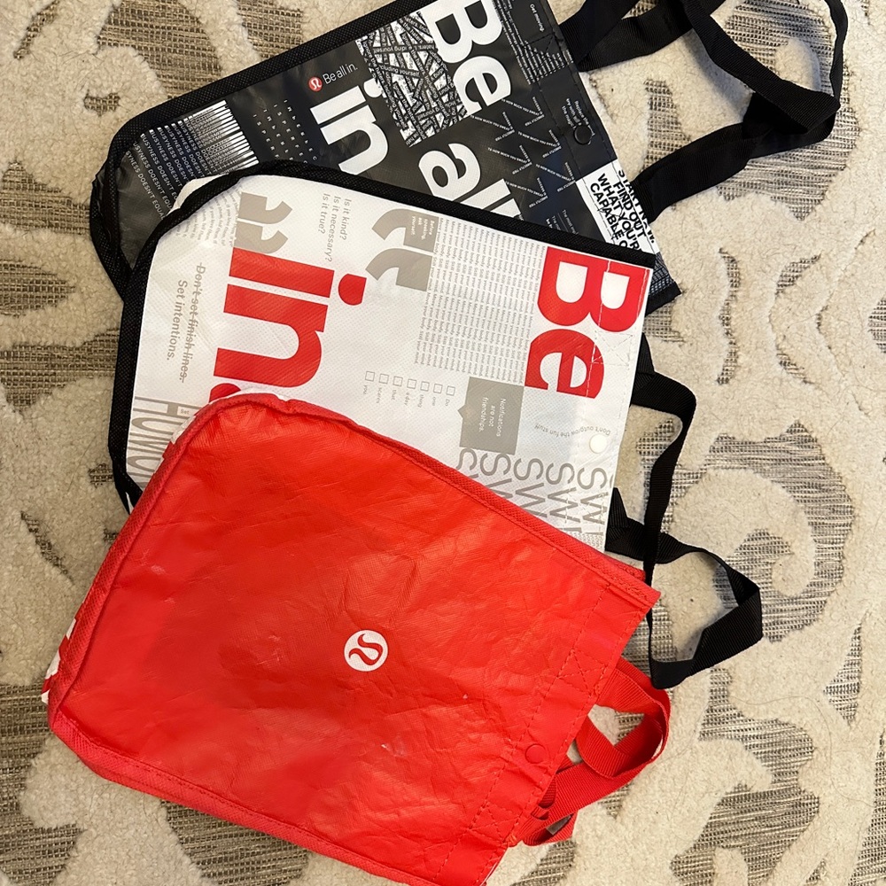 lululemon athletica Red and Black Graphic Tote Bags
